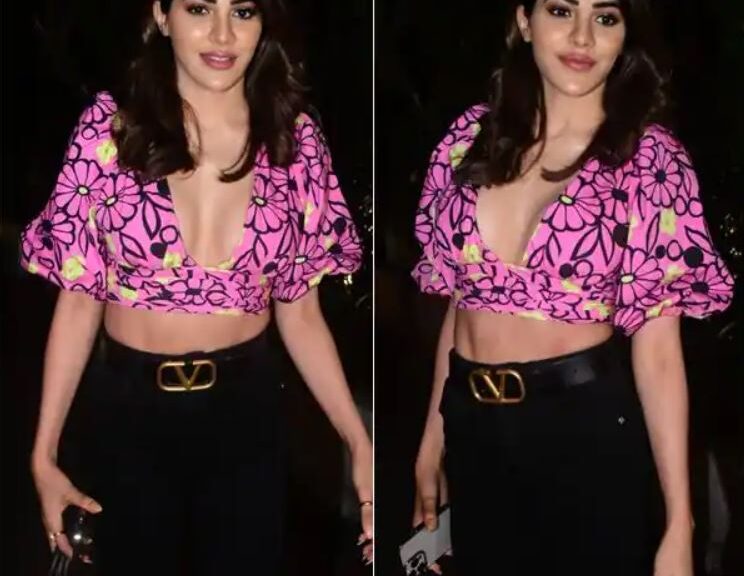 See pics! Nikki Tamboli flaunts her abs in a floral crop top